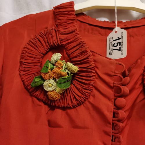 157 - 1930's red satin short sleeved long dress with flowers on chest