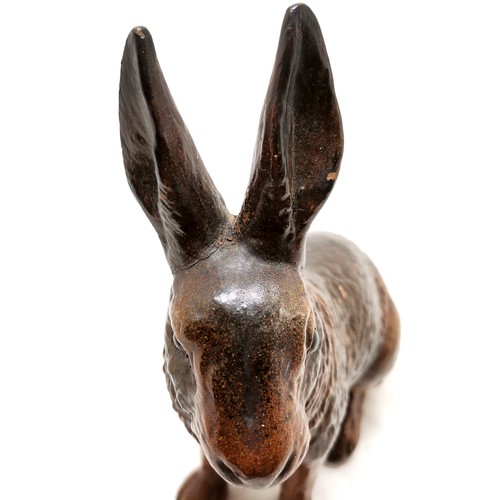 1 - Antique pottery seated hare - 21cm high & 1 ear has been re-attached and has slight losses to glaze