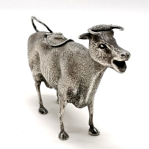 6 - Novelty silver plated cow creamer - 15cm across & 10cm high ~ has old repair to tail & the lid has a... 