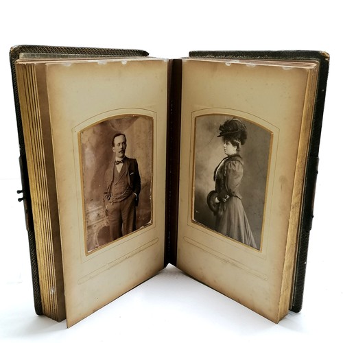 48 - Antique album containing qty of cabinet cards inc gymnast