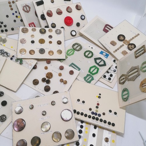 74 - Qty of buttons & buckles mounted on cards (ex-dealers stock)