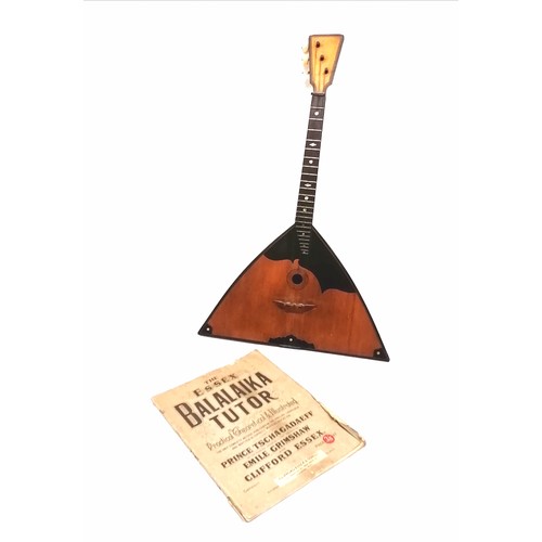 79 - Antique Balalaika: A Three string instrument with bone tuning knobs and Mother-of -Pearl and ebony d... 