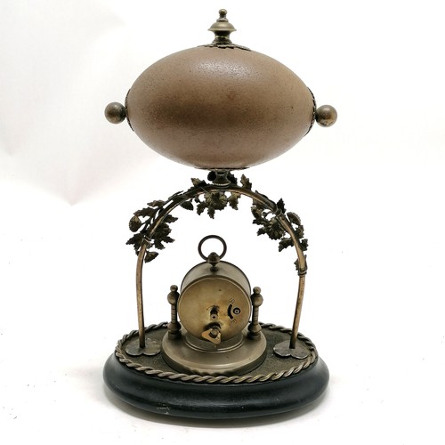 94 - Antique decorative clock with hand carved emu egg detail in silver plated mount - 30cm high - clock ... 