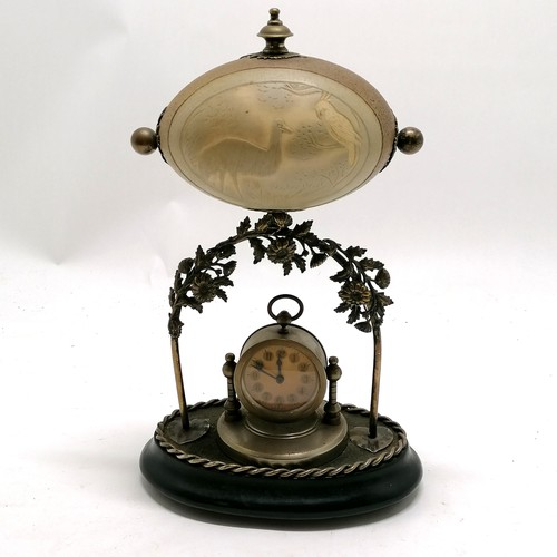 94 - Antique decorative clock with hand carved emu egg detail in silver plated mount - 30cm high - clock ... 