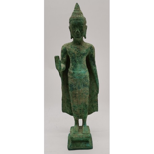 102 - Southeastern Asian Bronze, with green patination standing Buddha standing on a squared base , 31 cm ... 