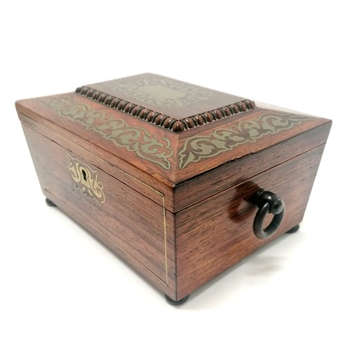 104 - Antique rosewood sewing box with brass inlaid detail, bun feet (1missing) and ring handles with a bl... 