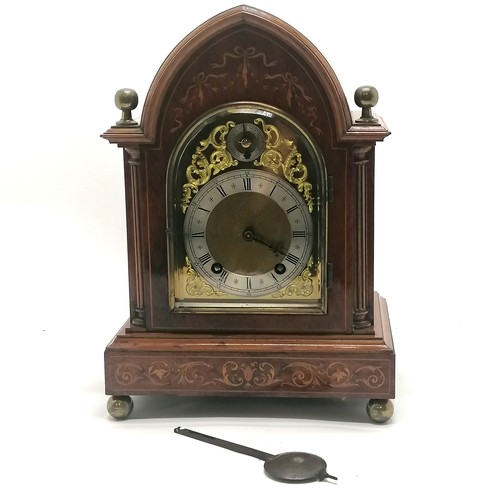 109 - Antique lancet shaped clock with brass dial with pierced decoration, brass finials terminating on 4 ... 