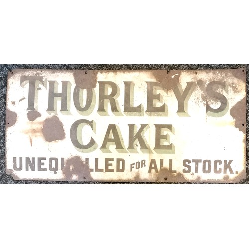 173 - Antique enamel Thorley's Cake sign. 85cm x 41cm. Has rust