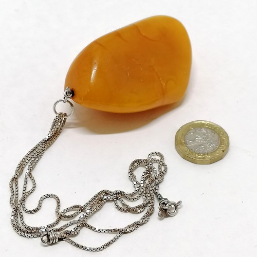 201 - Large amber natural pendant (7cm drop & 45g) on a silver 42cm double strand box link chain - total w... 