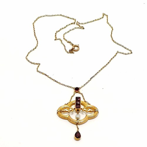 214 - Antique 9ct marked gold Art Nouveau integral pendant (5cm drop) set with garnets / pearl on chain (4... 