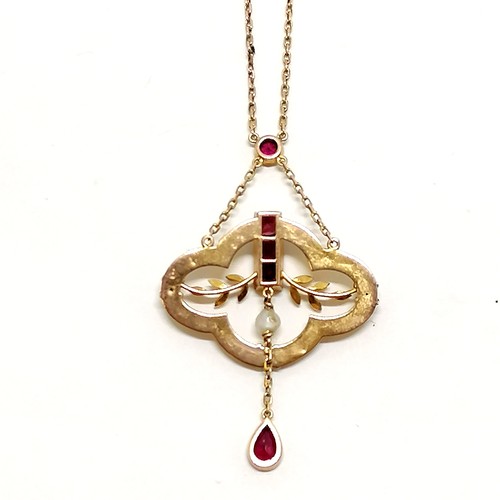 214 - Antique 9ct marked gold Art Nouveau integral pendant (5cm drop) set with garnets / pearl on chain (4... 