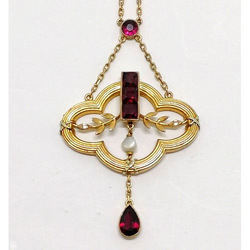 214 - Antique 9ct marked gold Art Nouveau integral pendant (5cm drop) set with garnets / pearl on chain (4... 