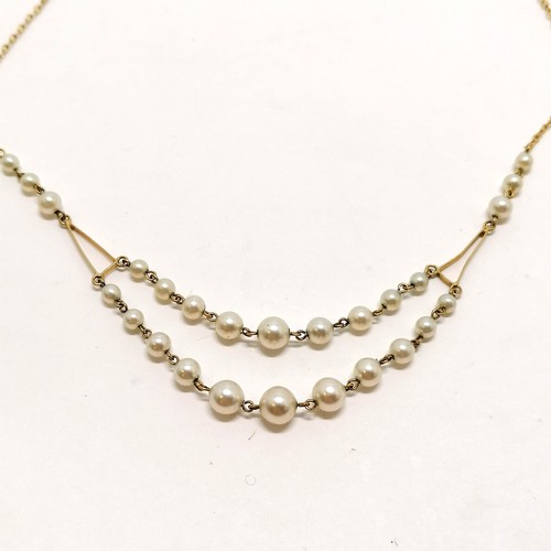 215 - 9ct marked gold necklace with pearl detail and double strand to the drop - 38cm & 5.2g total weight