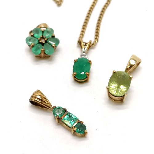 284 - 2 x 9ct marked gold emerald / diamond pendants (1 on a 9ct 44cm chain) t/w 2 x unmarked green stone ... 