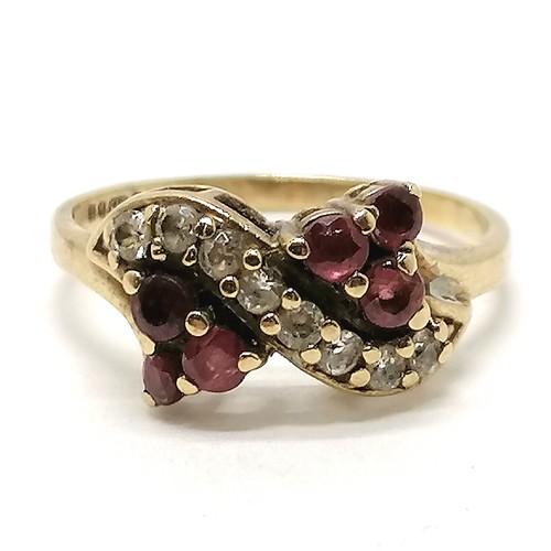 285 - 9ct marked gold wedding band (size K) t/w 9ct marked red & white stone ring (size K½) ~ total weight... 