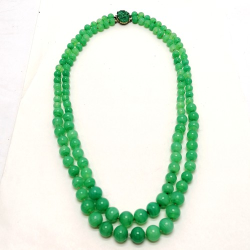 306 - Long 2 strand Chinese peking glass green bead necklace (60cm) t/w hardstone panel, 3 bangles etc