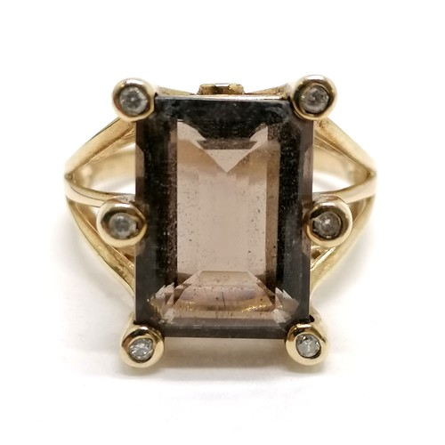 319 - 9ct hallmarked gold smoky quartz & diamond (8 stones inc 2 to the top / bottom) ring - size Q½ & 5.3... 