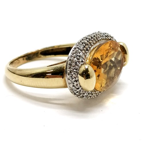 320 - 9ct marked gold citrine & diamond set ring - size P½ & 5.7g ~ the hallmarks have been mostly obliter... 