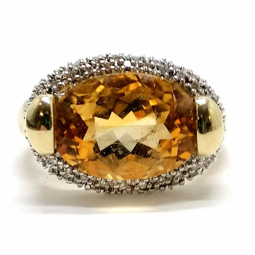 320 - 9ct marked gold citrine & diamond set ring - size P½ & 5.7g ~ the hallmarks have been mostly obliter... 