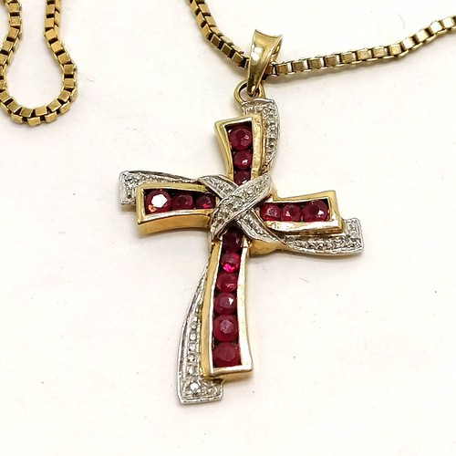 349 - 9ct marked gold ruby & diamond set cross on a 9ct hallmarked gold 34cm box link chain - total weight... 