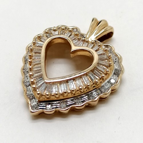 358 - 14ct marked gold diamond set (inc baguettes) heart pendant - 2.2cm drop & 3.7g total weight