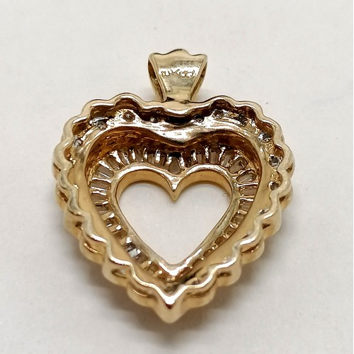 358 - 14ct marked gold diamond set (inc baguettes) heart pendant - 2.2cm drop & 3.7g total weight