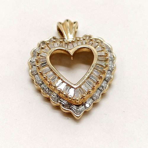 358 - 14ct marked gold diamond set (inc baguettes) heart pendant - 2.2cm drop & 3.7g total weight