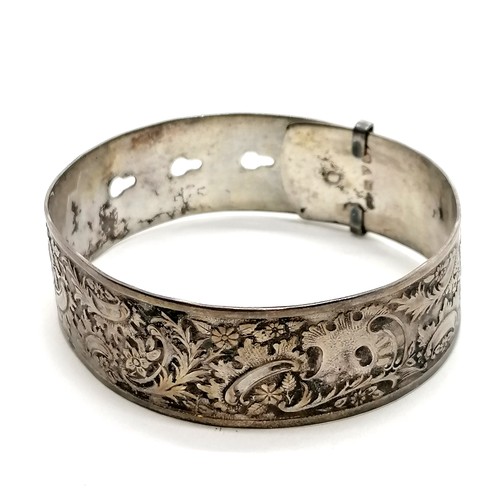 2 x silver bangles - 68g total weight (the half engraved bangle with ...