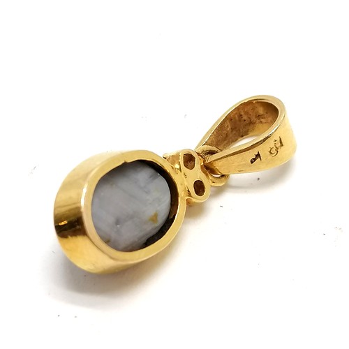 364 - Unmarked 18ct gold star sapphire & diamond set pendant - 2.2cm drop & 2.6g total weight