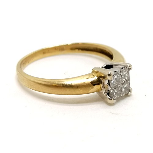 368 - 18ct hallmarked (marks rubbed) gold ring set with 4 princess cut diamonds - size I & 1.9g total weig... 