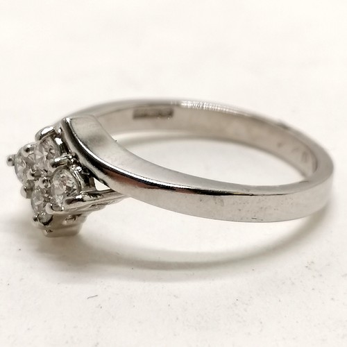 377 - 18ct hallmarked white gold 4 stone diamond crossover ring - size Q & 5.2g total weight