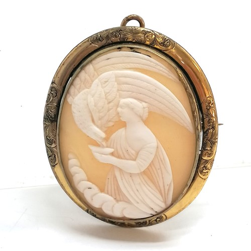 419 - Antique hand carved shell cameo brooch of Hebe offering a cup to her father Zeus (in the form of an ... 