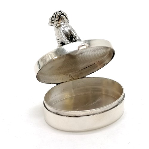 420 - Silver marked oval pill box with dog sat atop - 17g & 3cm across