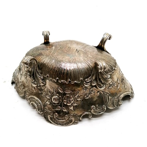 454 - Continental silver embossed bon-bon dish on 4 cast feet - 14cm across x 5.5cm high & 132g