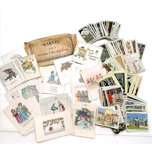 556 - Packet of Marvel Christmas / New Year unused cards t/w qty of cigarette cards inc Wills floral & Chu... 