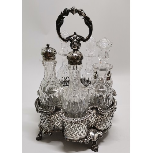 567 - Rococo 7 bottle cruet stand T/W Webb Hand Cut Continental Lead Crystal pedestal rose bowl, the four-... 