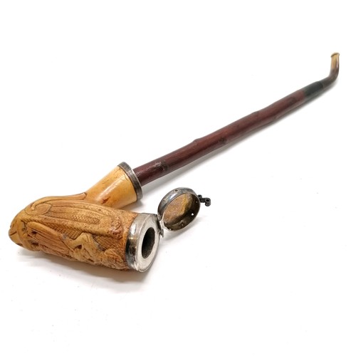 610 - A Large antique meerschaum pipe with wood & horn stem & unmarked silver mounts and middle eastern fi... 