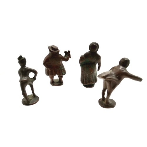 634 - 4 x antique bronze cast pipe tampers of Dickens characters - tallest 4cm