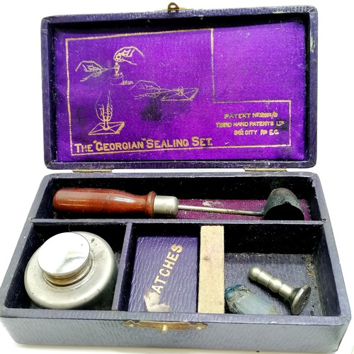 650 - Boxed Georgian Sealing Set, Tin plate Atlas and globe pencil sharpener, 7cm high