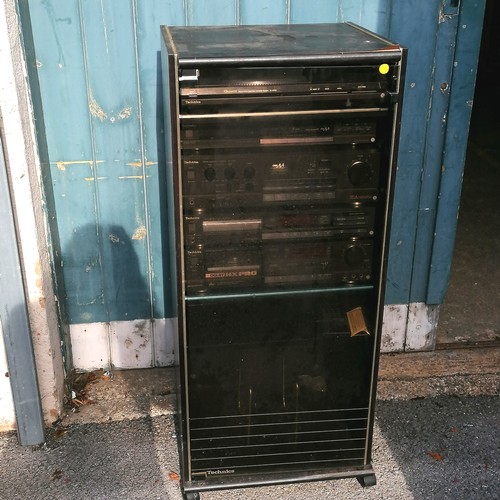 A Technics HiFi system with containing a quartz direct drive