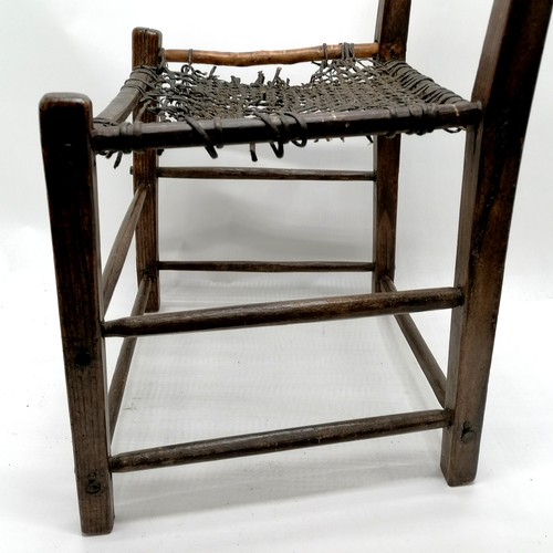 839 - Irish primitive chair of the famine period with woven leather seat (a/f) - 85cm high 44cm wide 36cm ... 