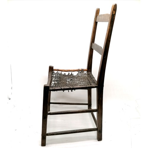 839 - Irish primitive chair of the famine period with woven leather seat (a/f) - 85cm high 44cm wide 36cm ... 