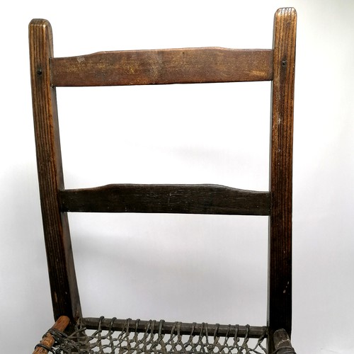 839 - Irish primitive chair of the famine period with woven leather seat (a/f) - 85cm high 44cm wide 36cm ... 