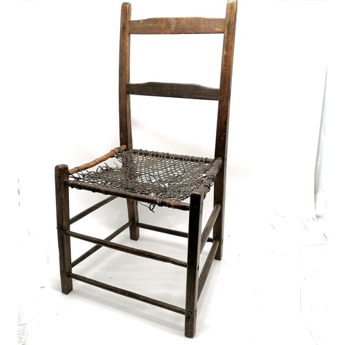 839 - Irish primitive chair of the famine period with woven leather seat (a/f) - 85cm high 44cm wide 36cm ... 