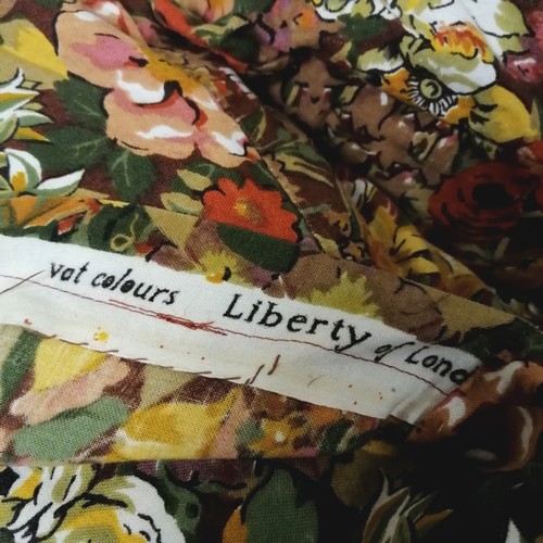 40 - Five Liberty of London 'cottage garden' fabric covered cushions 40cm x 40cm in good used condition.