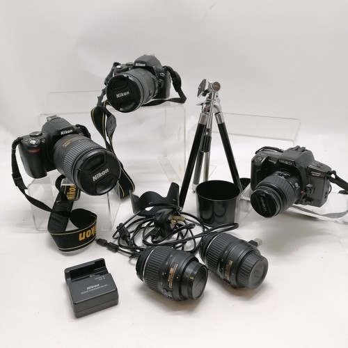 54 - 2 x Nikon D40 cameras with lenses (DX SWM VR ED IF Aspherical Φ72 & Φ77), Minolta Dynax 303si with l... 