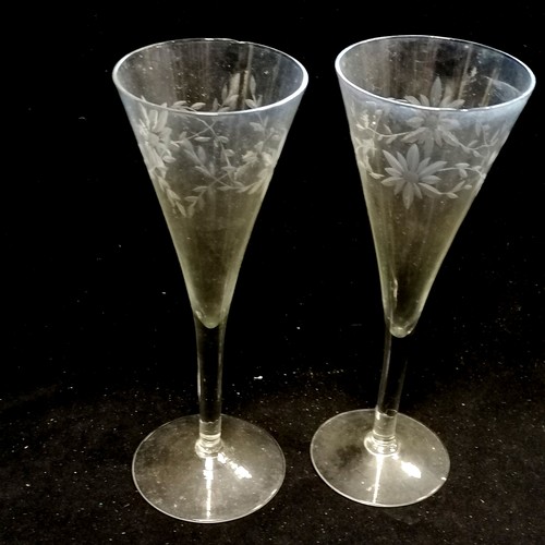 82 - 8 antique etched champagne flutes, 2 have small chips to the rims