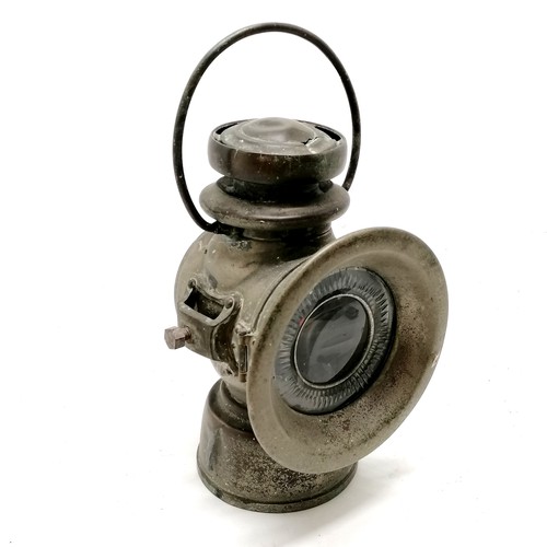 137 - King Road Lucas no.75C motoring oil lamp. 32cm to top of handle. Has a fracture rto the top and old ... 