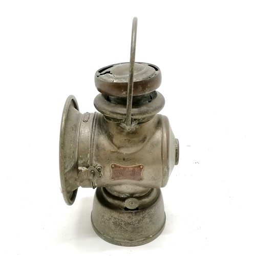 137 - King Road Lucas no.75C motoring oil lamp. 32cm to top of handle. Has a fracture rto the top and old ... 