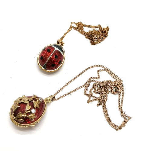 273 - 2 x unmarked enamel pendants (ladybird & egg locket pendant - a/f on reverse) both on 9ct marked gol... 